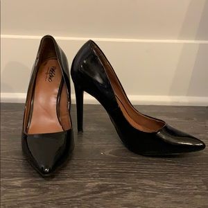 Black patent leather pumps